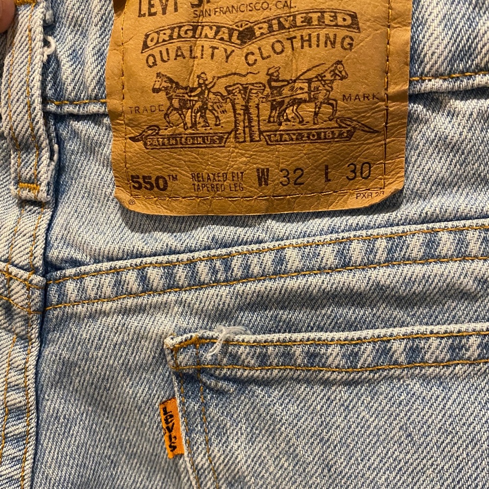 Vintage orange Tag Levi 550